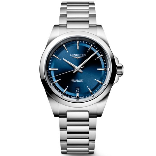 A Longines Conquest Automatic watch with a polished silver-tone stainless steel case and integrated bracelet, featuring a deep blue dial with silver indices and hands.