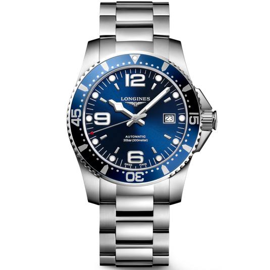 Longines watch with blue dial and silver bracelet on a white background
