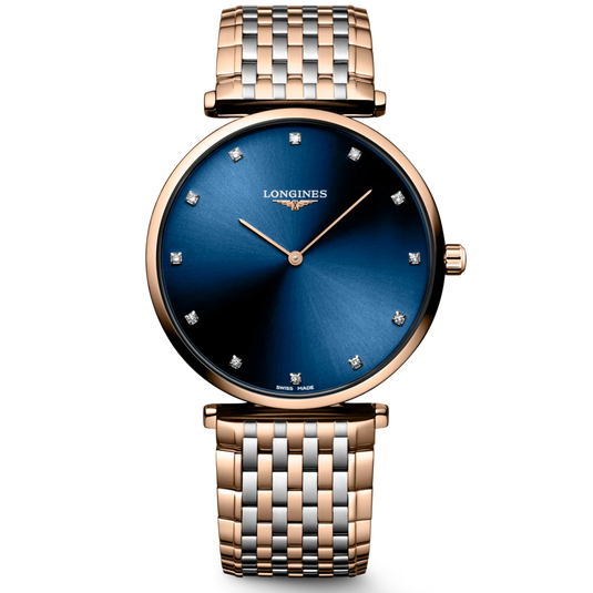 Luxury watch with blue dial and rose gold case on a white background