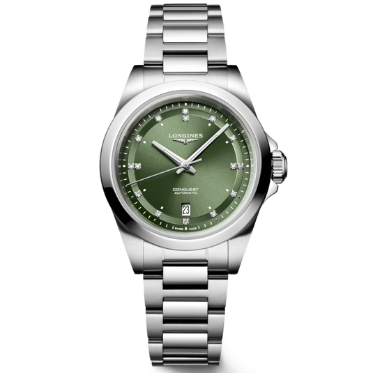 A Longines Constellation watch with a polished silver-tone stainless steel case and integrated bracelet, featuring a green dial with silver-tone indices and hands.