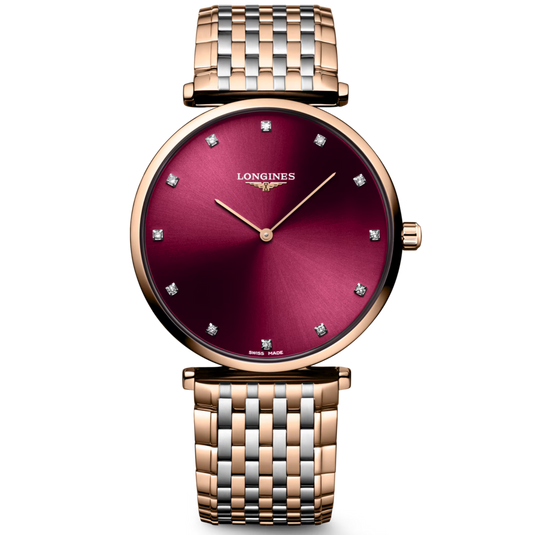 Luxury watch with a red dial and rose gold bracelet on a white background