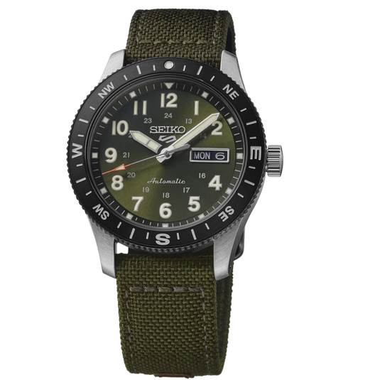 Seiko watch with green strap and black dial on a white background