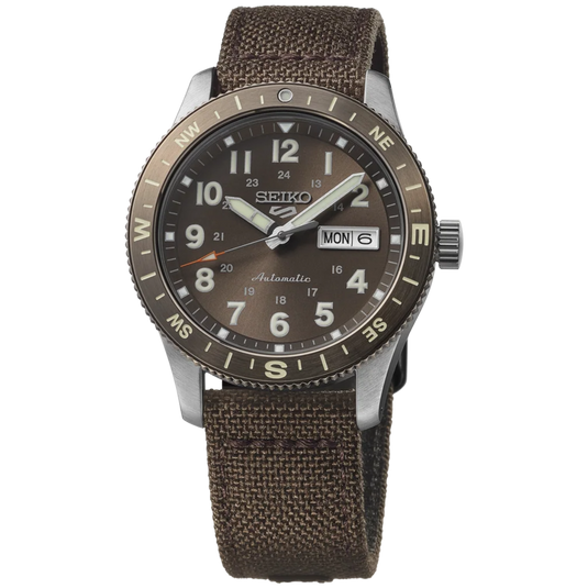 A Seiko Almasse automatic watch with a brown dial, a brown textured fabric strap, and a silver-tone stainless steel case on a white background.