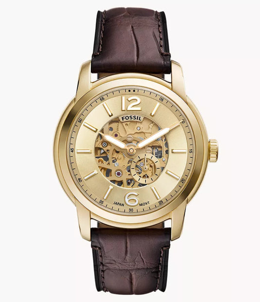 Gold watch with brown leather strap on a white background