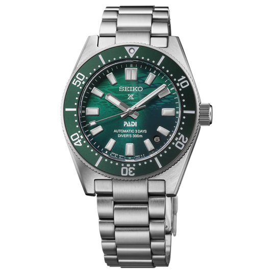 A Seiko X Avex automatic watch with a green dial and green bezel, paired with a silver stainless steel case and link bracelet, shown against a plain white background.