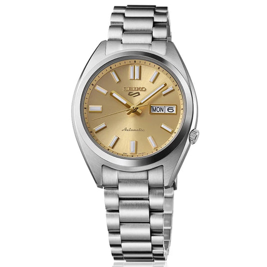 Silver watch with a gold face on a white background