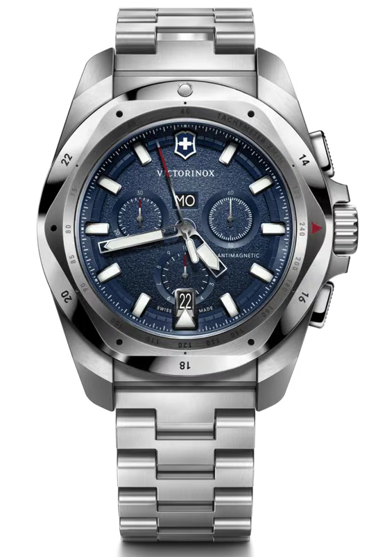 Victorinox stainless steel chronograph watch with a textured blue dial, silver-tone case, and matching metal link bracelet