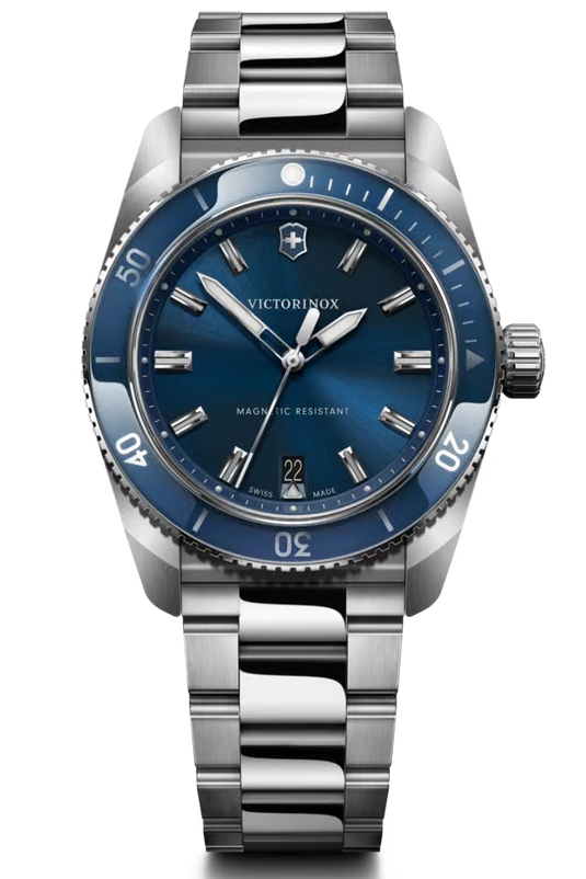 Victorinox stainless steel watch with a blue sunburst dial, blue bezel, silver-tone case, and integrated metal bracelet on a white background.